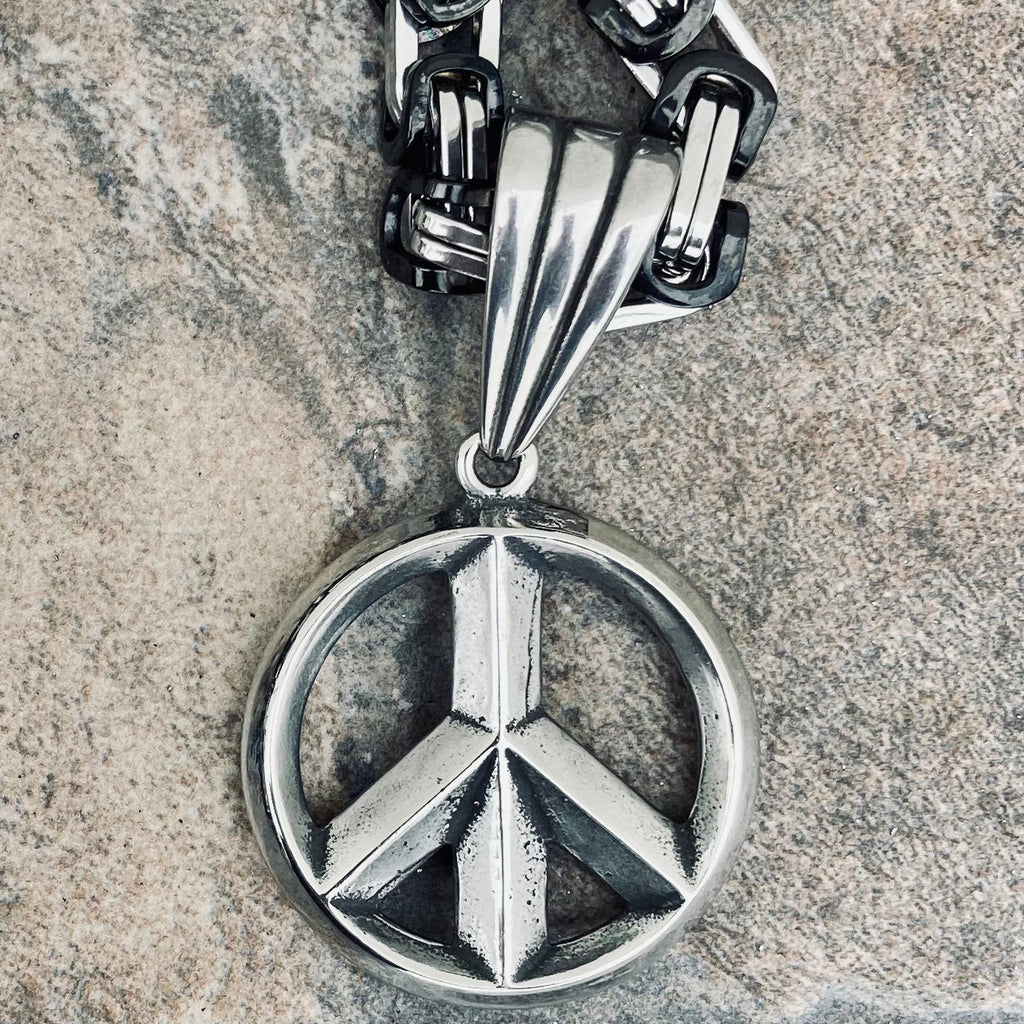 Peace symbol necklace Cut Out Stock Images & Pictures - Alamy